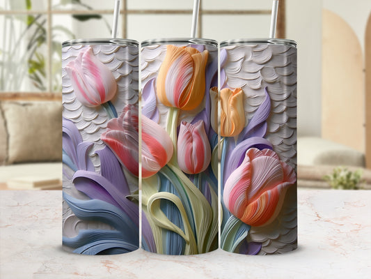 Three textured tumblers with a floral tulip design in pastel colors.