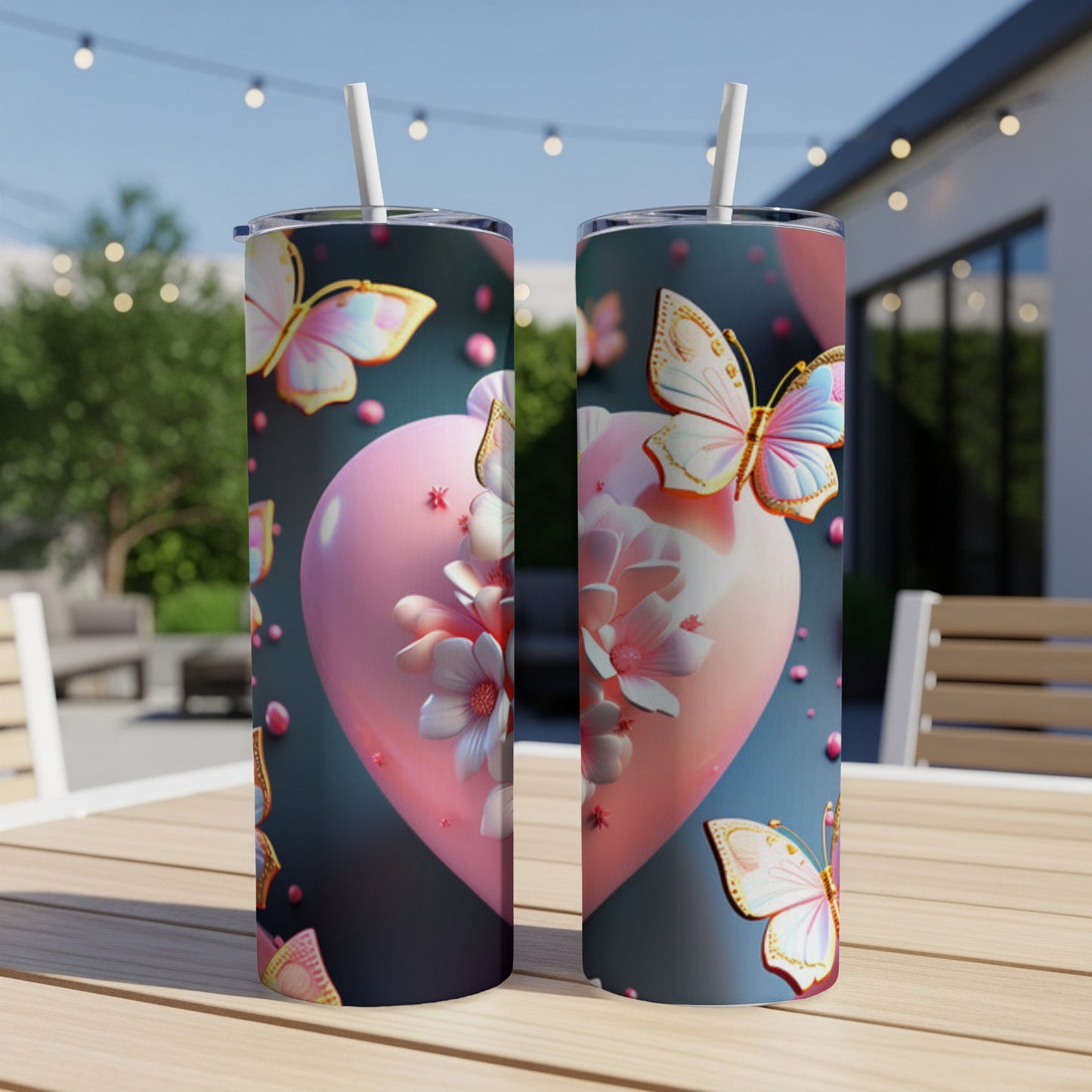 Two tumblers with pink hearts and butterflies, set on a wooden table.