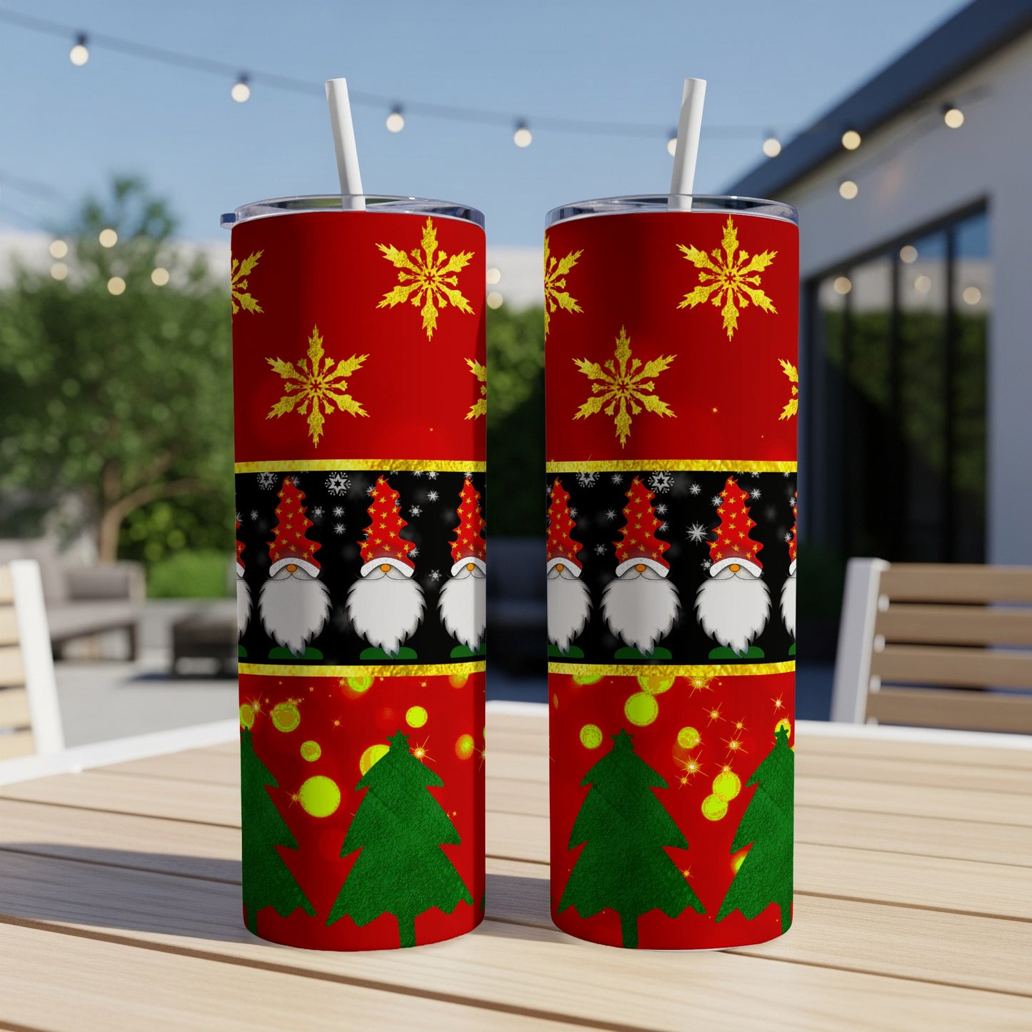 Two tumblers with Christmas gnomes, snowflakes, and trees.