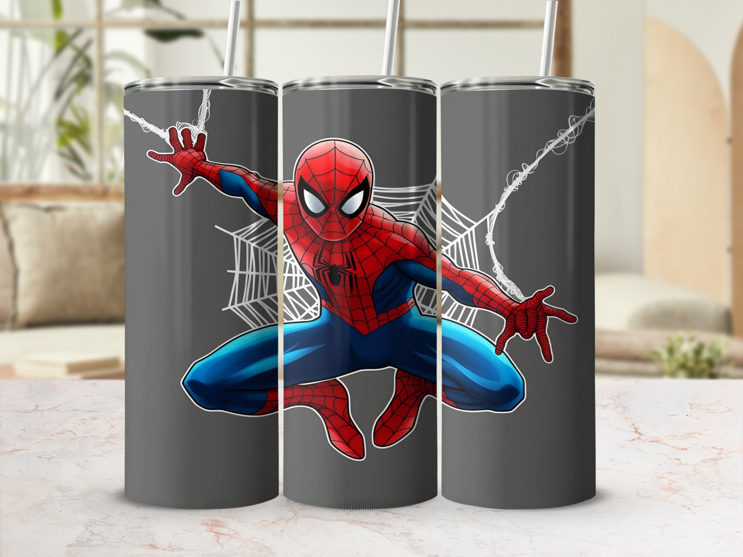 Spiderman in costume with web design on a gray tumbler with straw.