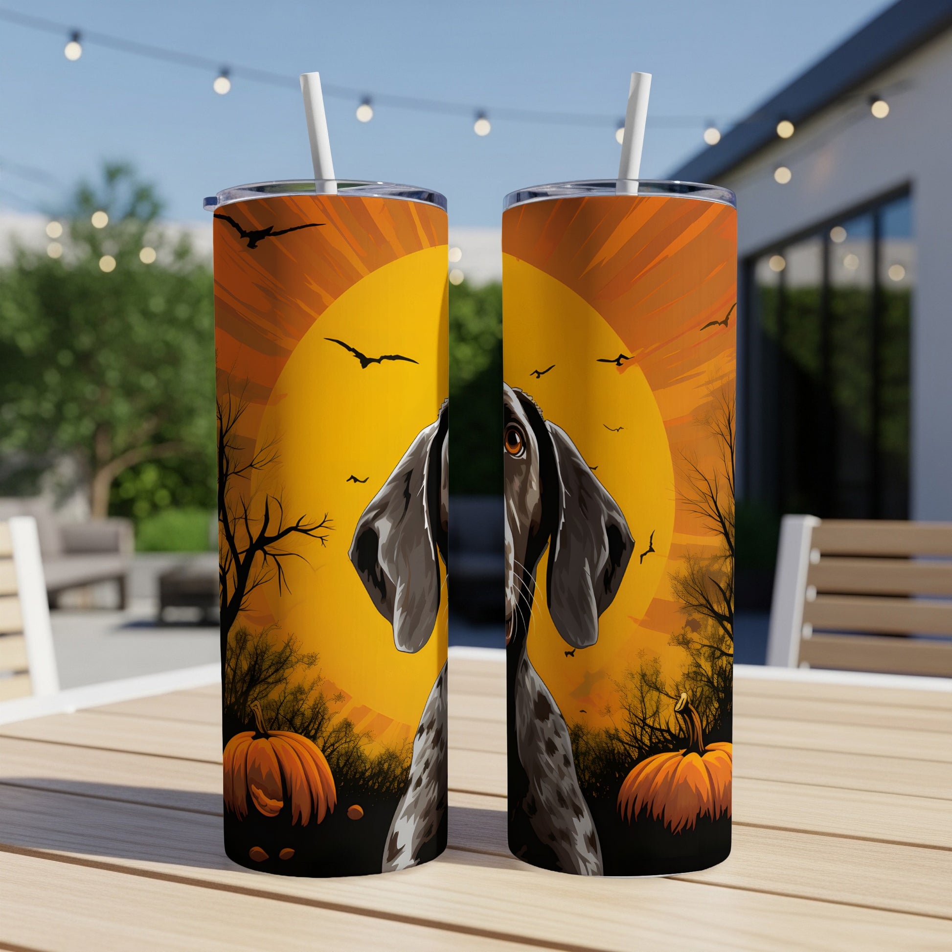 Two tumblers with a German Shorthaired Pointer and Halloween theme.