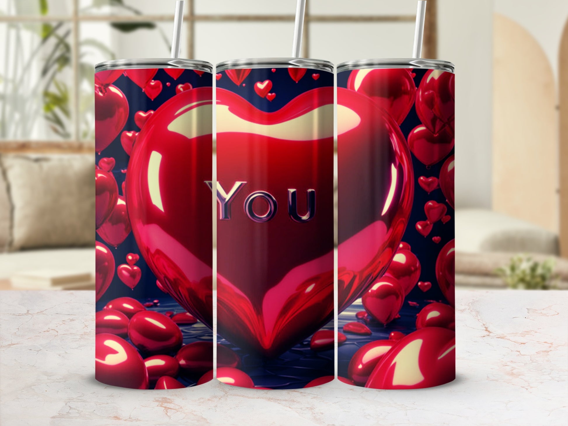 Three heart-shaped tumblers with "YOU" on the front tumbler.