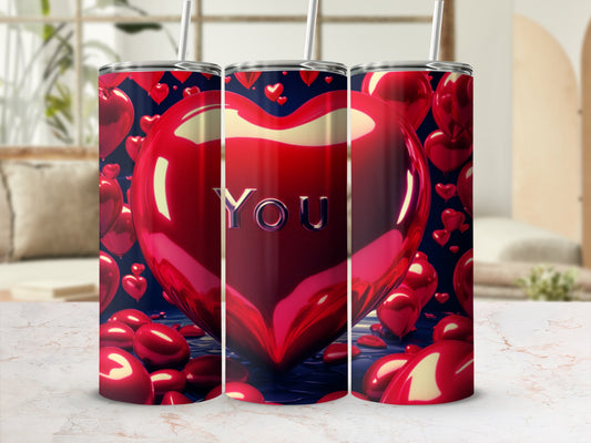 Three heart-shaped tumblers with "YOU" on the front tumbler.