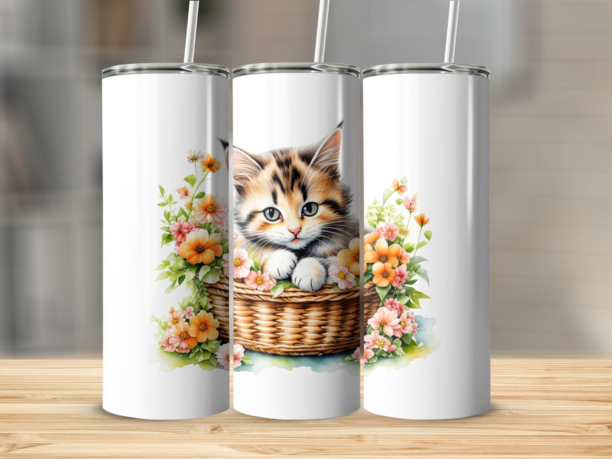 White tumbler with a kitten peeking from a flower-filled basket.