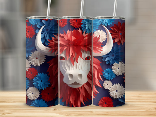 Tumbling tumbler with patriotic red, white, and blue floral yak design.