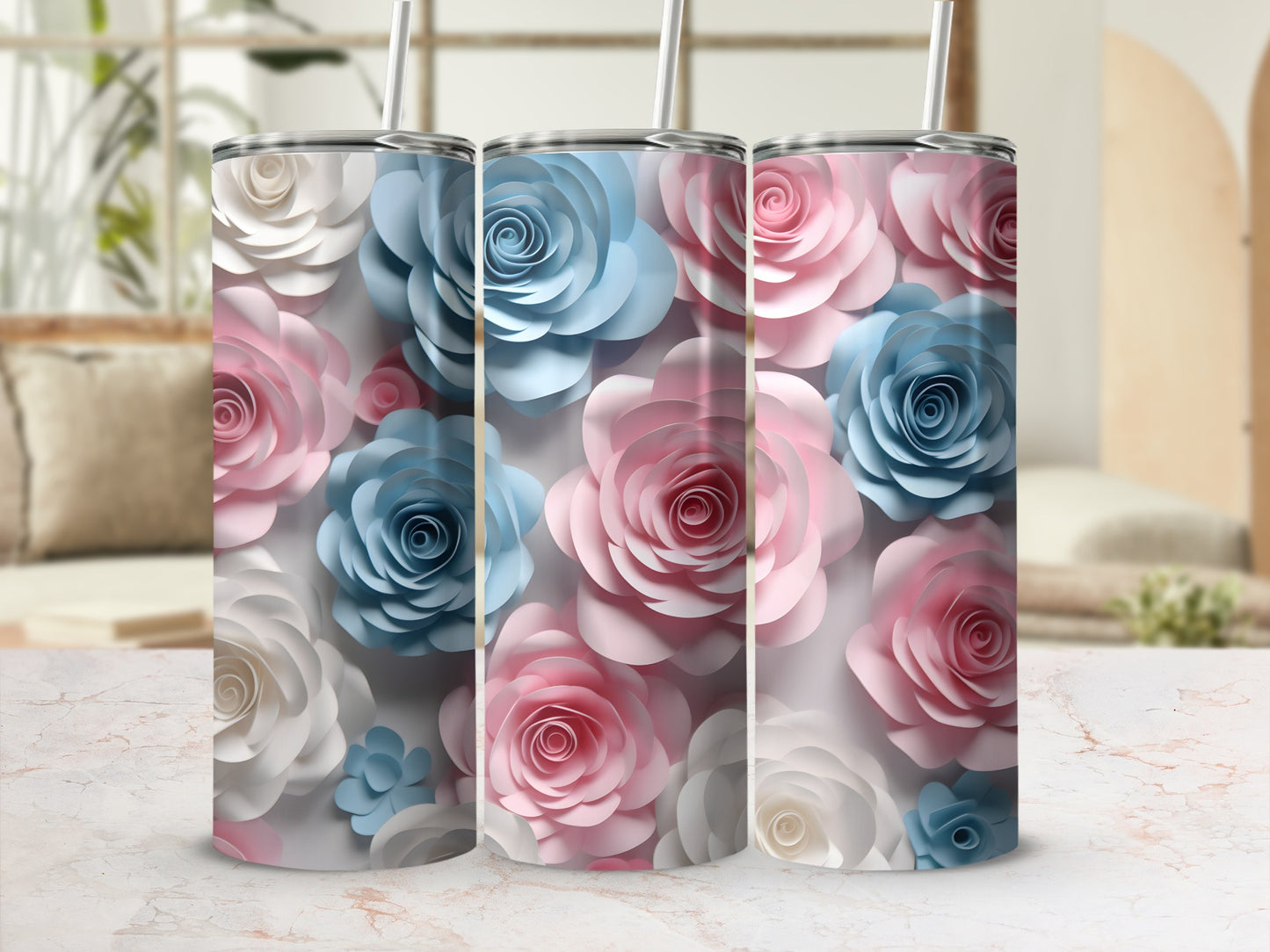 Three tumblers with pastel pink, blue, and white floral designs.