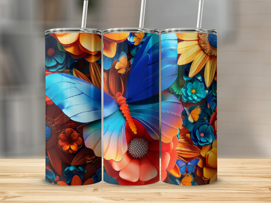 Three tumblers with colorful floral and butterfly designs, side by side.