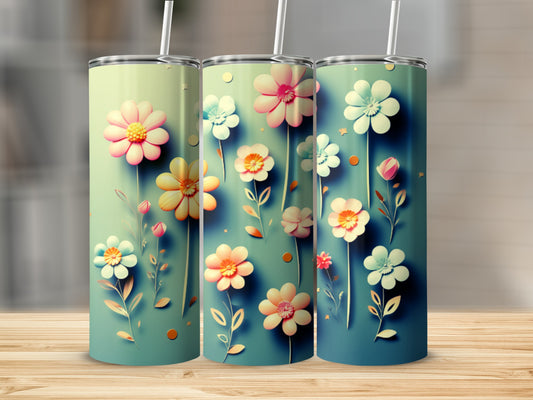 Three tumblers with pastel floral designs on a wooden surface.