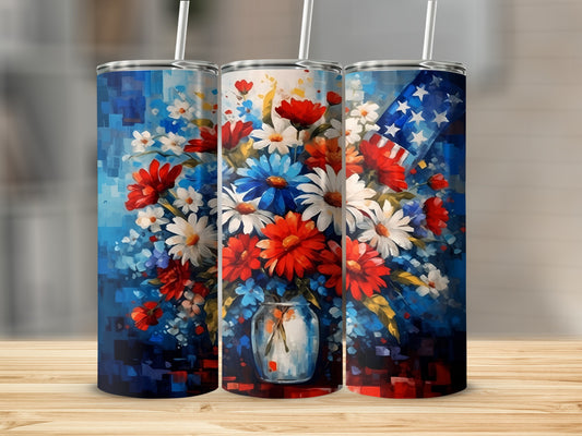 Three tumblers with floral and American flag designs on a wooden surface.