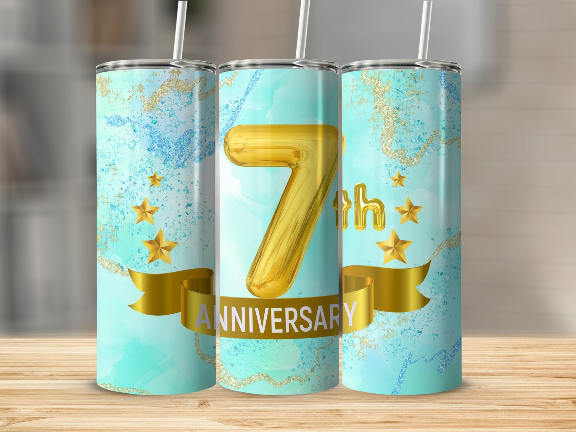 Gold balloon with "7th Anniversary" text on marbled tumblers.