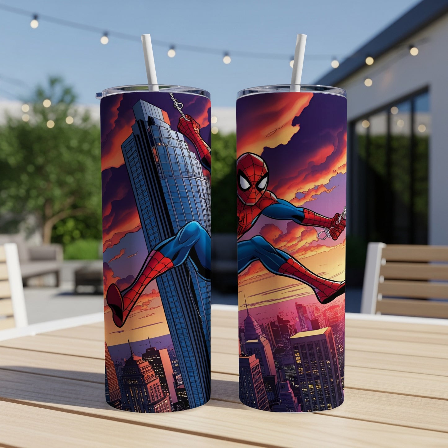 Spiderman swings across a city skyline at sunset on two insulated tumblers.
