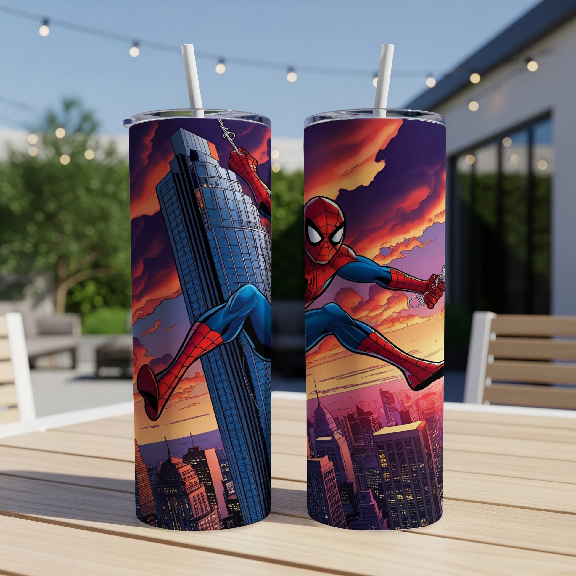 Spiderman swings across a city skyline at sunset on two insulated tumblers.