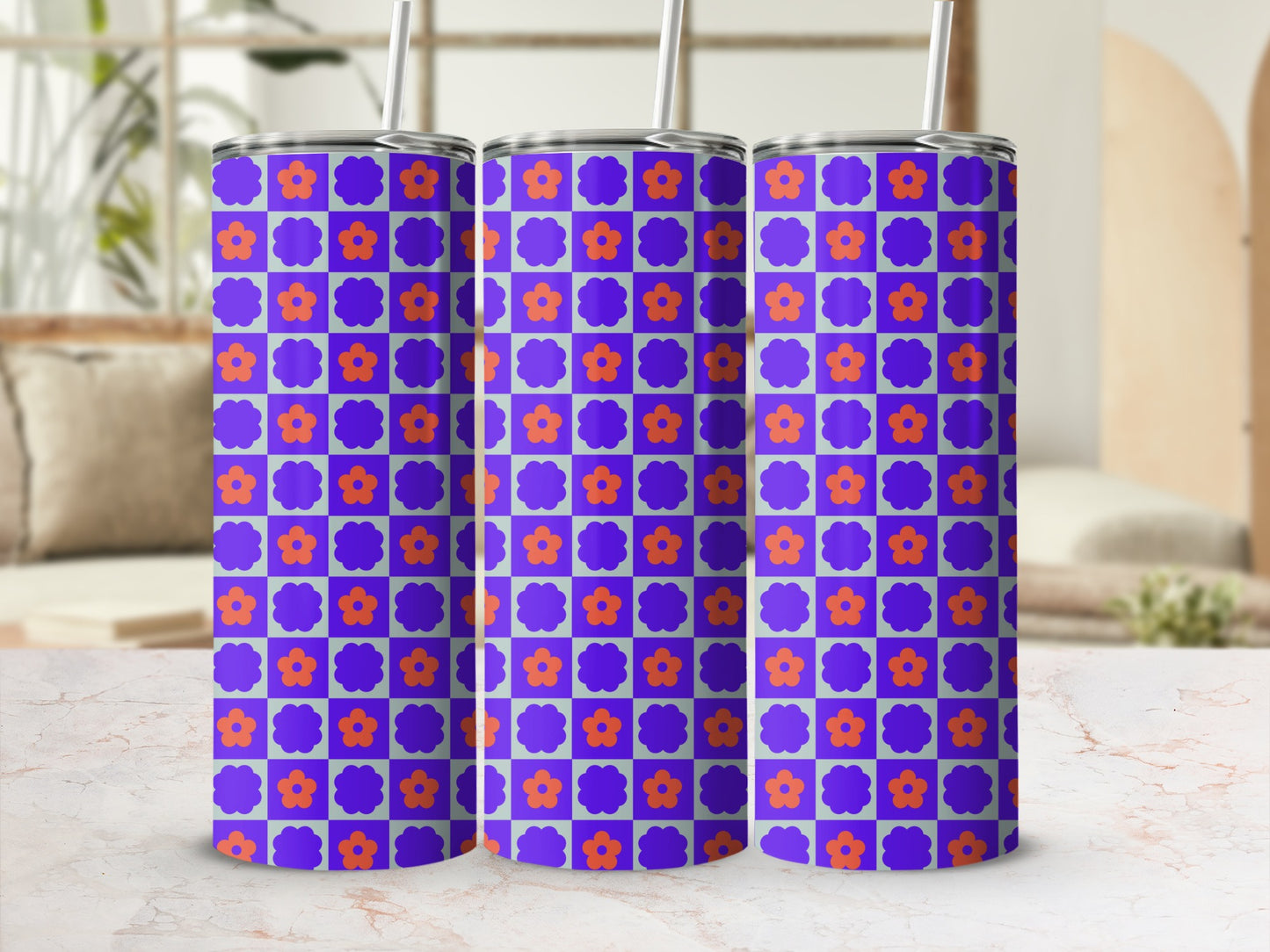 Three purple tumblers with an orange and blue floral pattern.