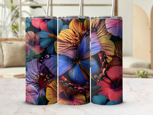 Three tumblers with floral and butterfly patterns.