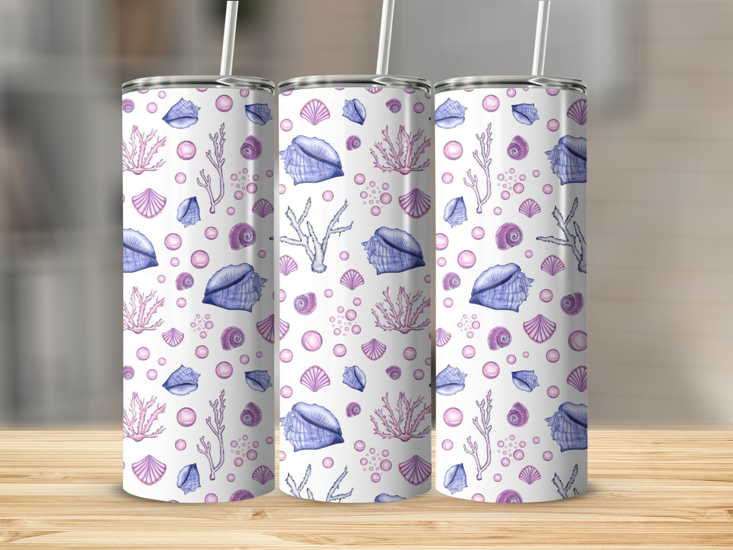 Triptych of tumblers with a repeating pattern of shells and coral.