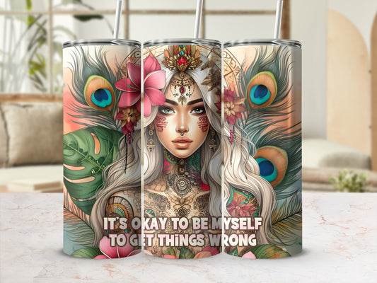 Tumbler with woman, peacocks, and "It's okay to be myself to get things wrong" text.