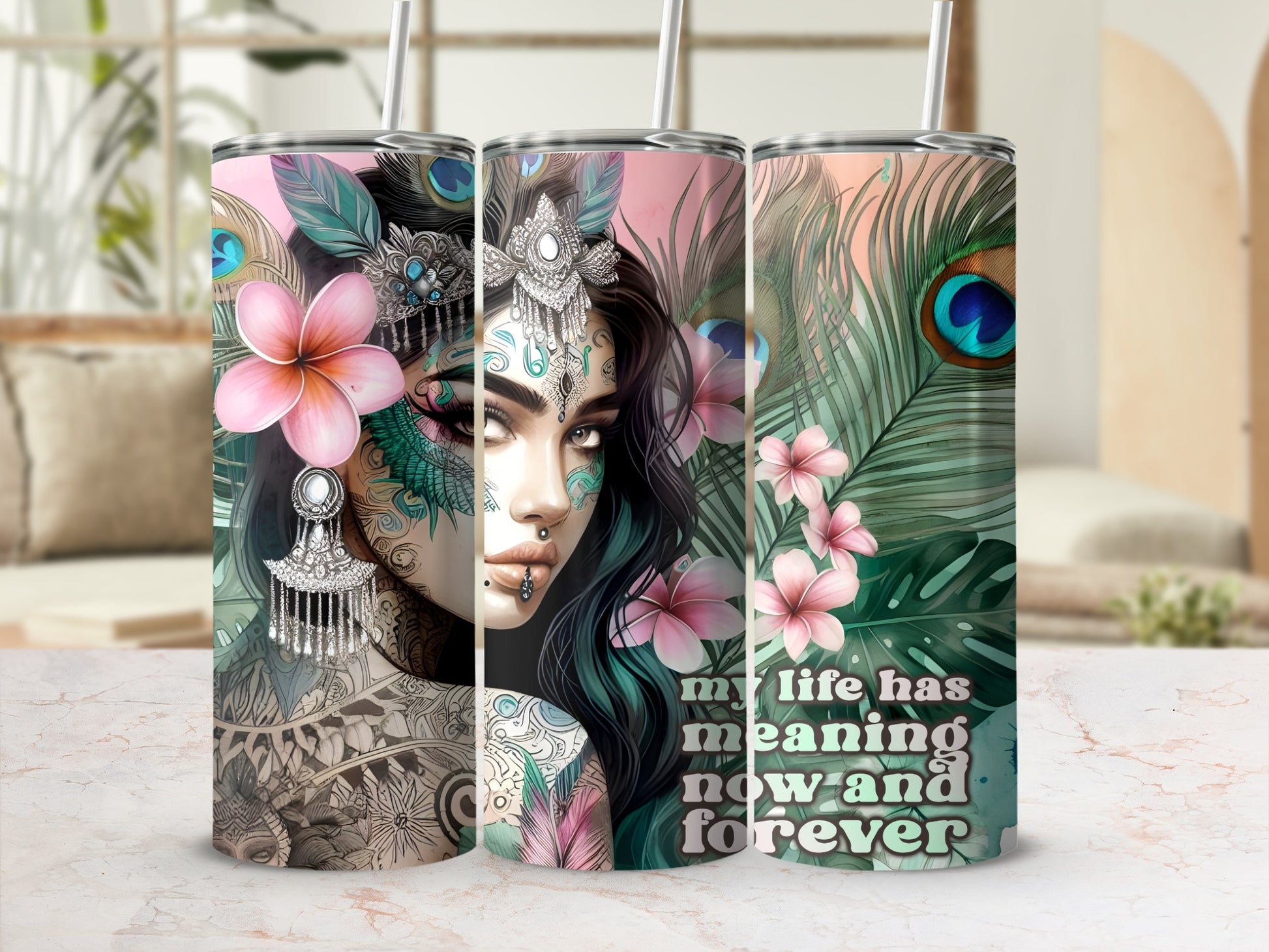 Tumbler with woman's face, feathers, and "my life has meaning now and forever" text.