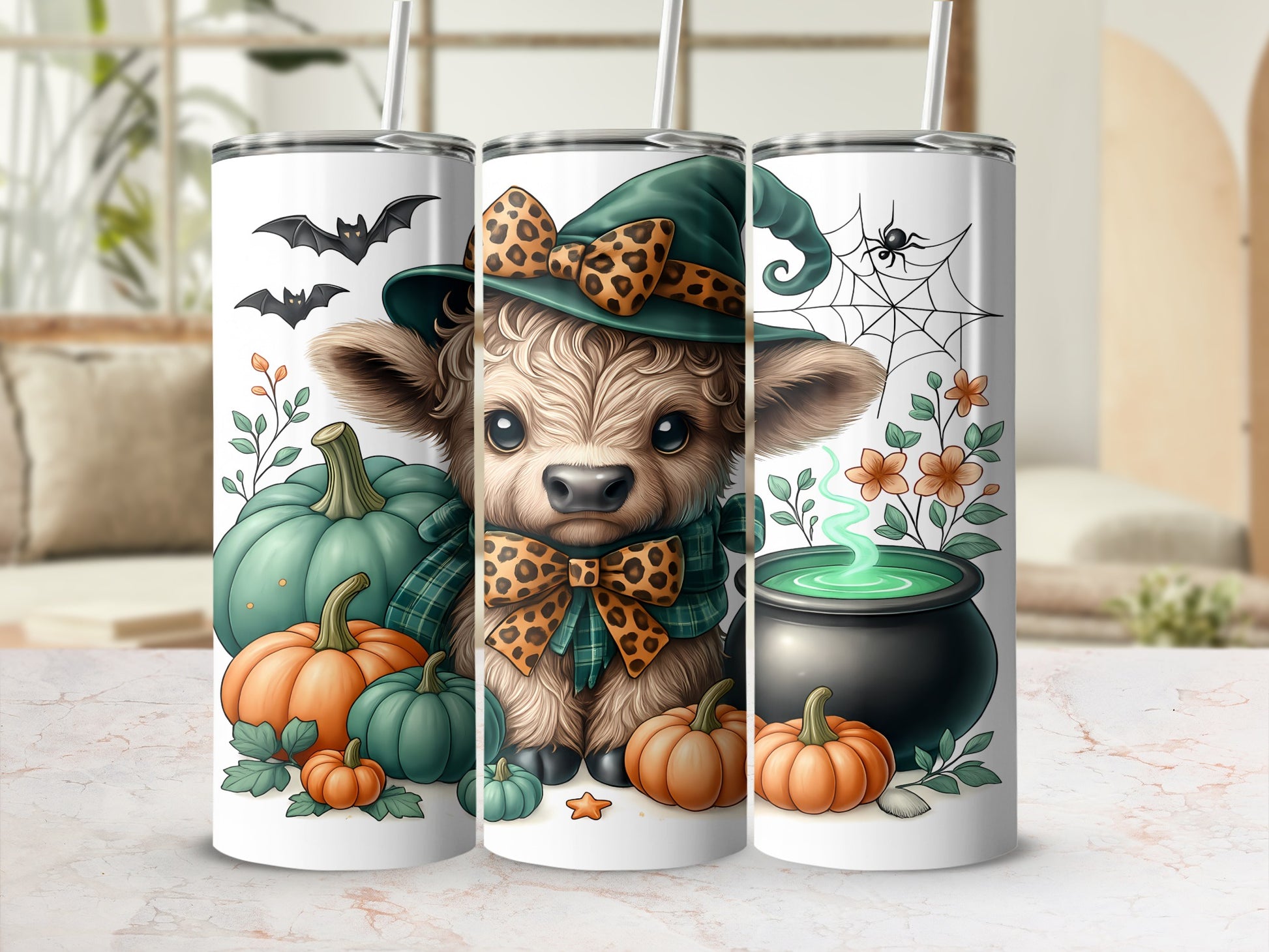 Cow in witch hat with pumpkins, bats, and cauldron on Halloween-themed tumblers.