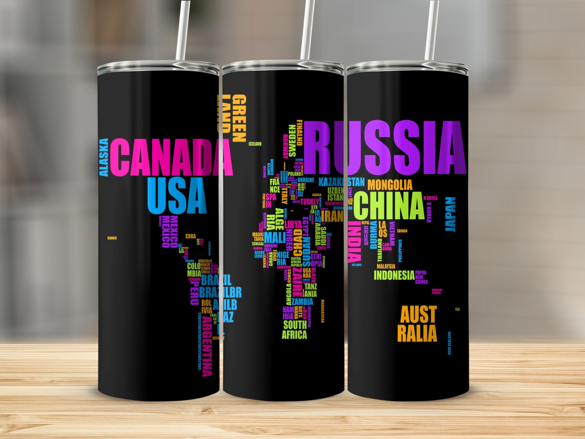 Black tumbler with world map made of colorful country names.