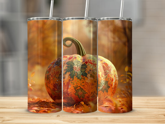 Triptych of a pumpkin adorned with ornate floral and leaf patterns.