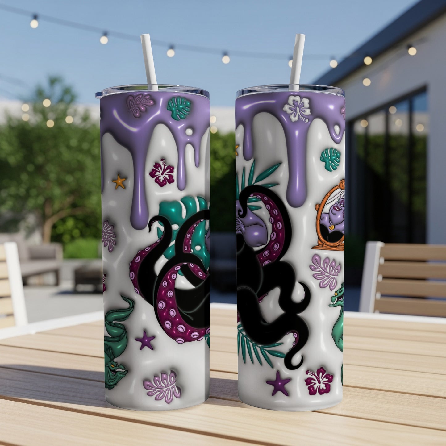 Two purple and teal patterned tumblers with octopus tentacles and floral designs.