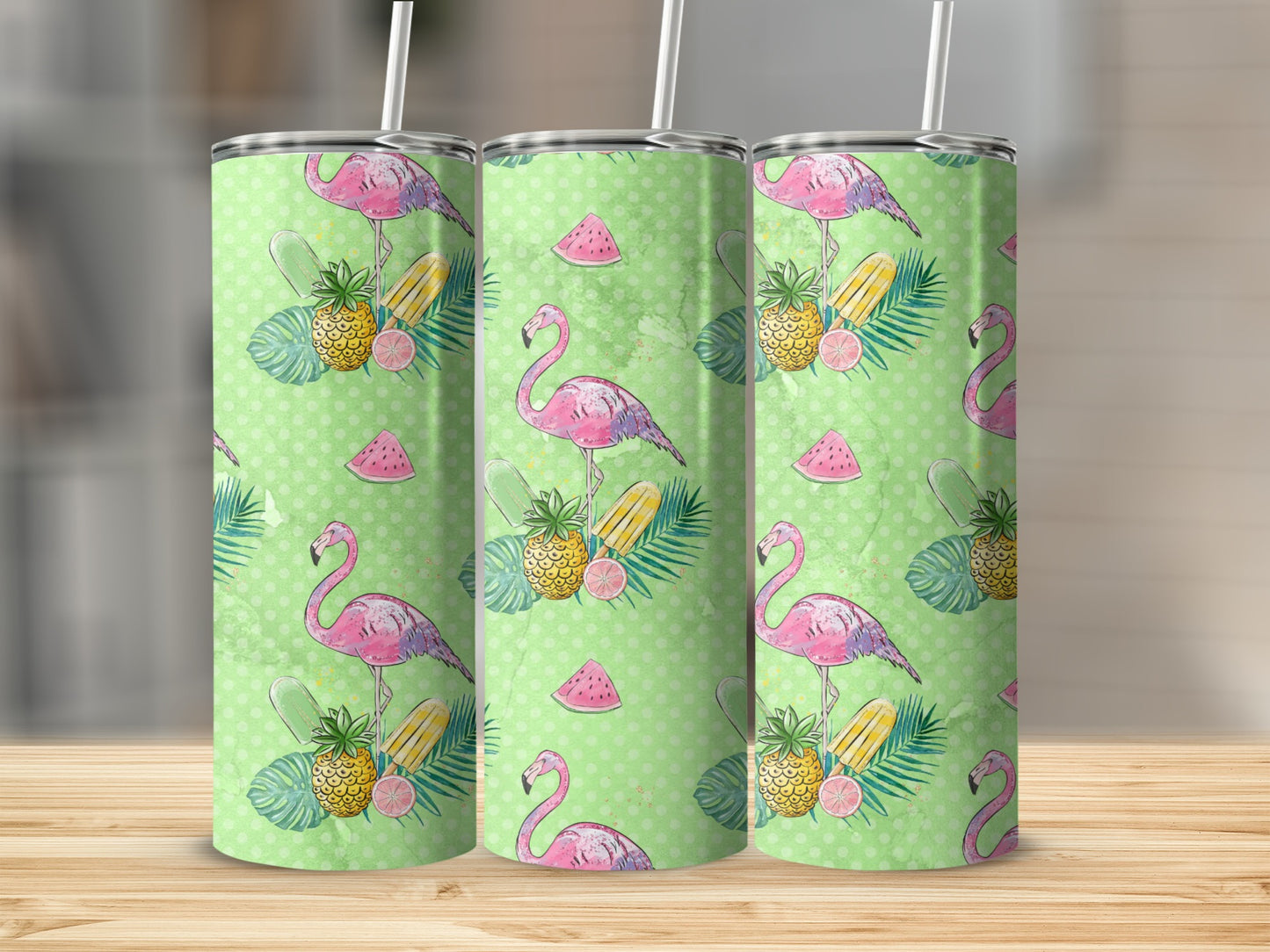 Three tumblers with a flamingo, pineapple, and watermelon pattern.