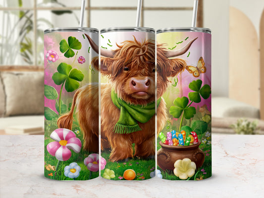 Highland cow in green scarf with Easter eggs and shamrocks.