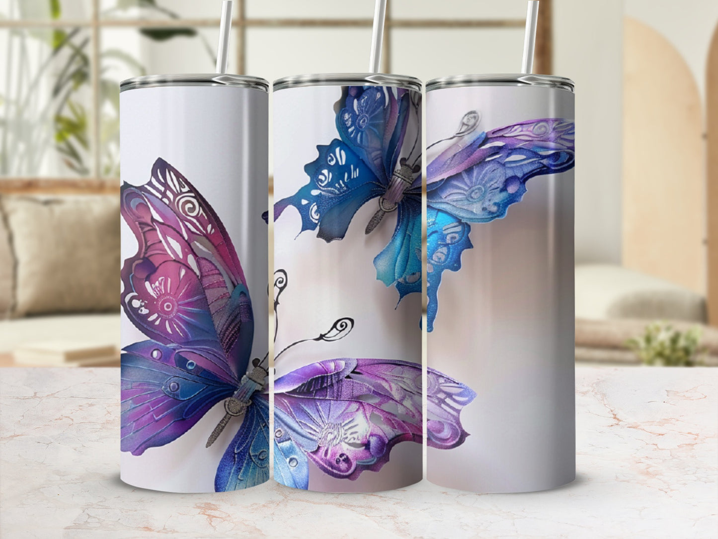 Three tumblers featuring watercolor-style purple and blue butterflies.