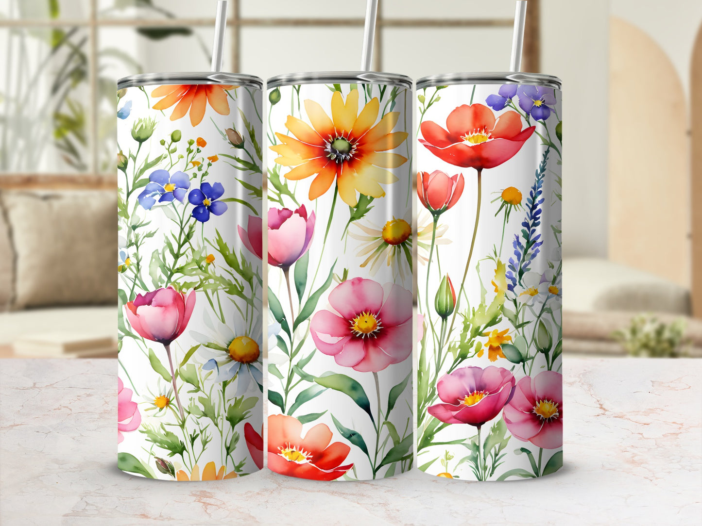 Floral tumblers with colorful poppies, daisies, and greenery.
