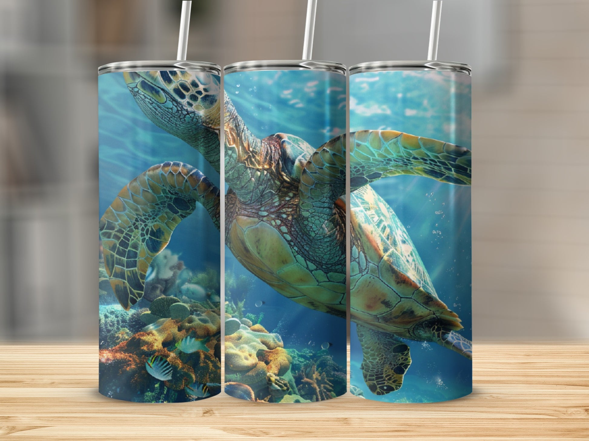 Three tumblers featuring a sea turtle swimming through coral reef.