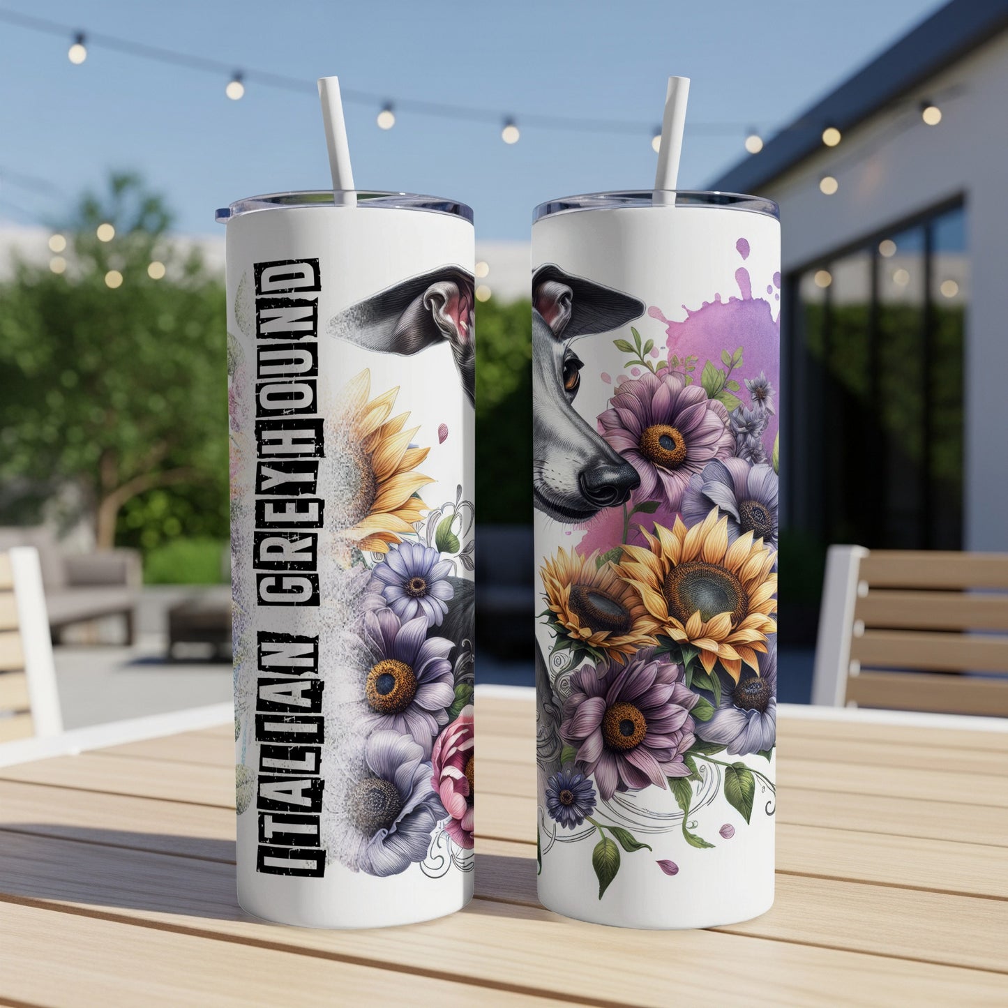 Two tumblers with Italian Greyhound and floral designs on a patio table.