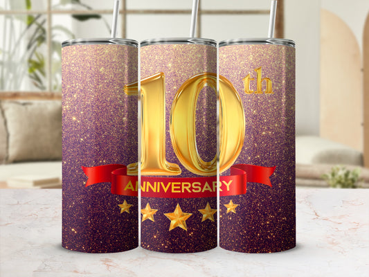 Gold "10th Anniversary" text with stars on a glitter tumbler.
