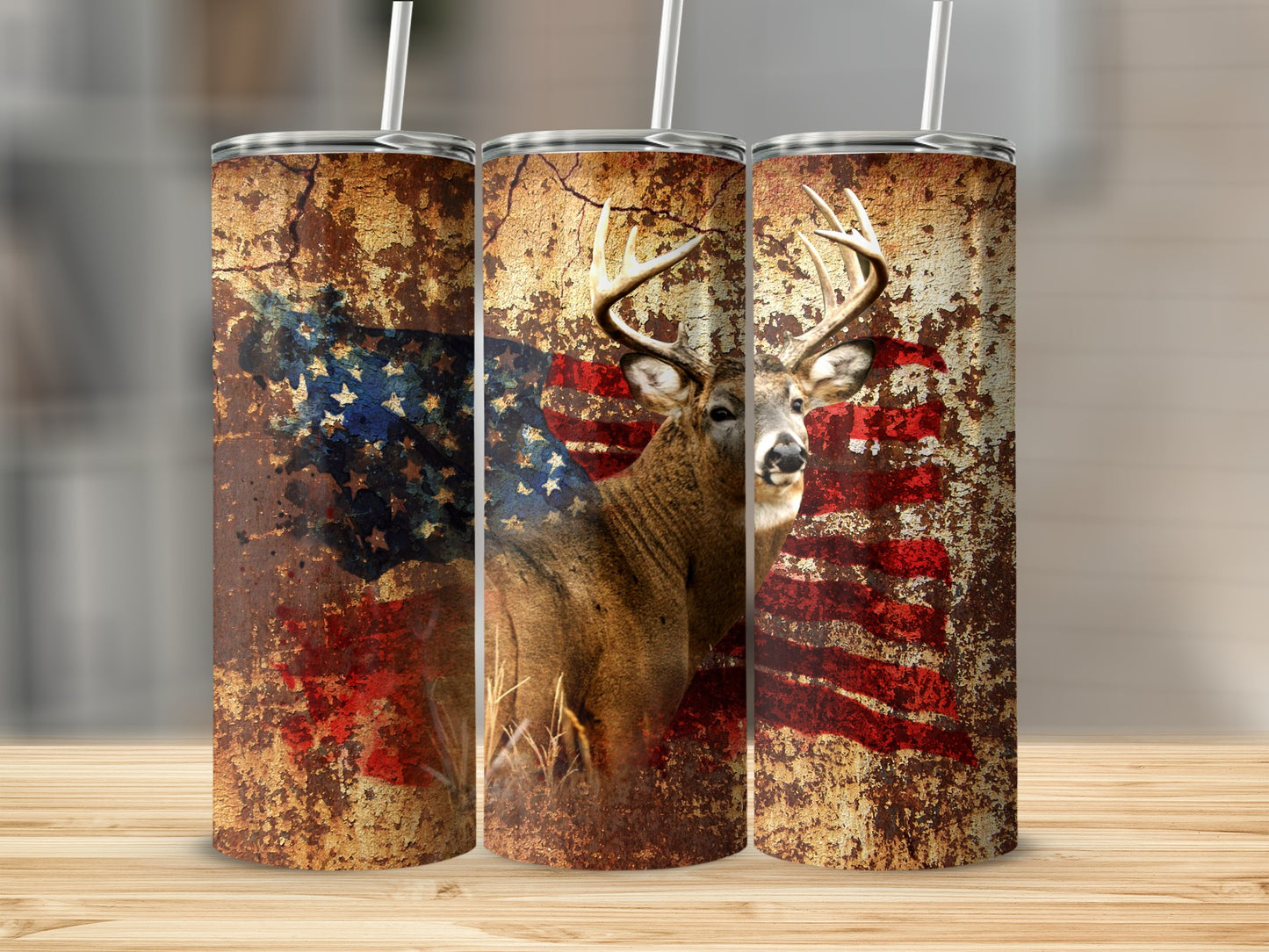 Deer and distressed American flag design on three tumblers.