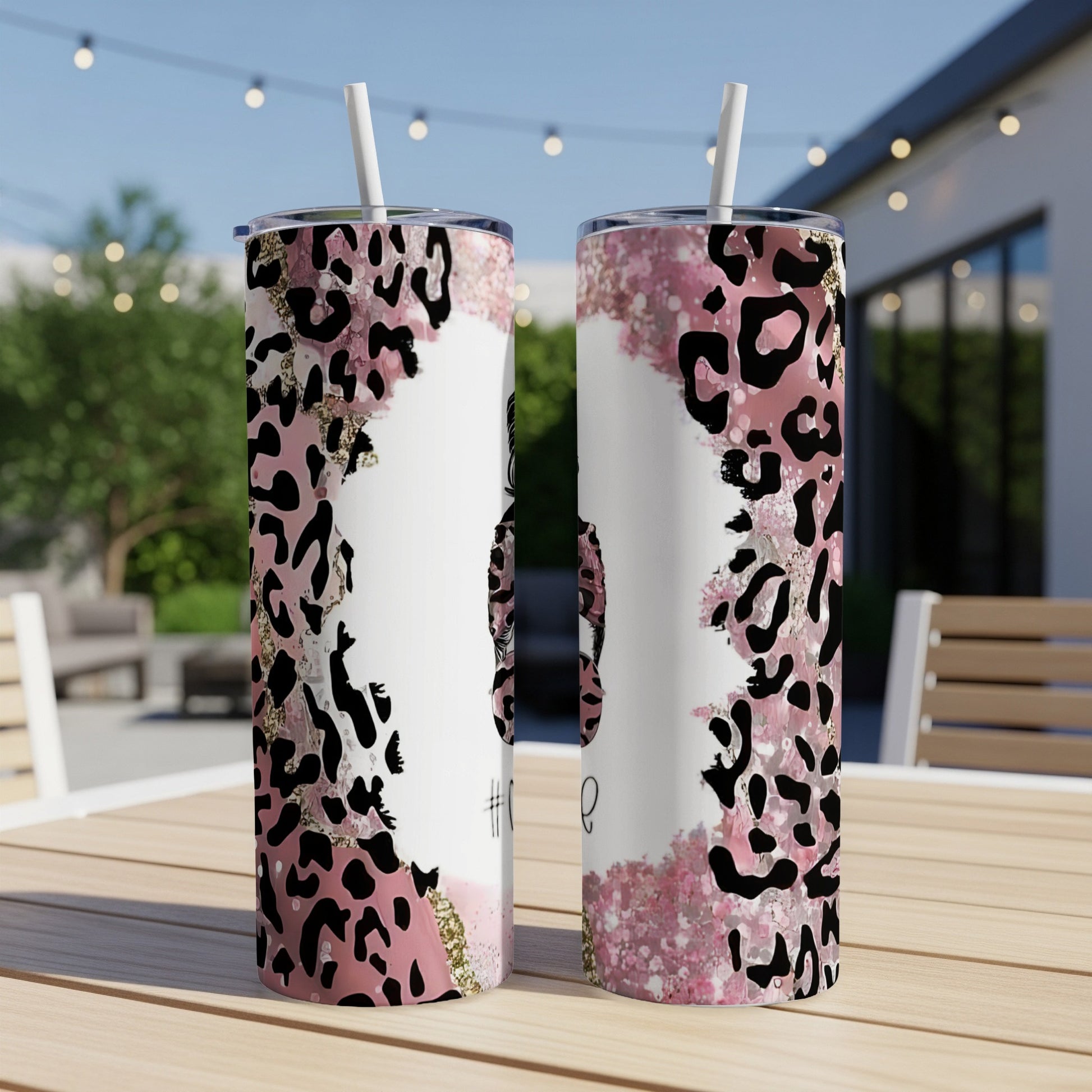 Two tumblers with pink leopard print and glitter detail, one showing text.