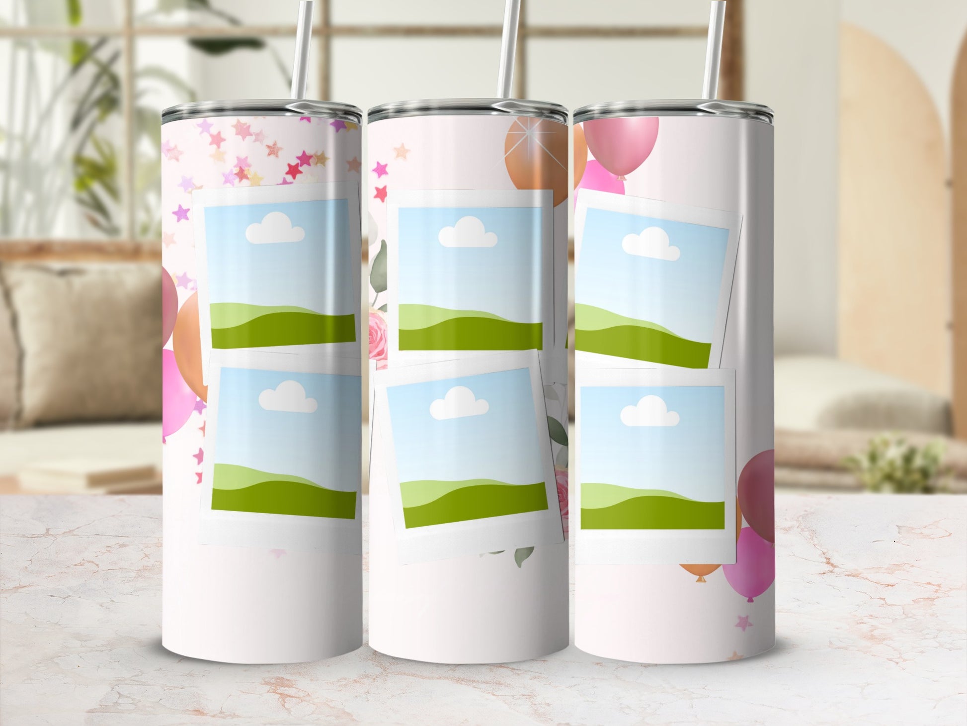 Three tumblers with stars, balloons, and photo frames on a light background.