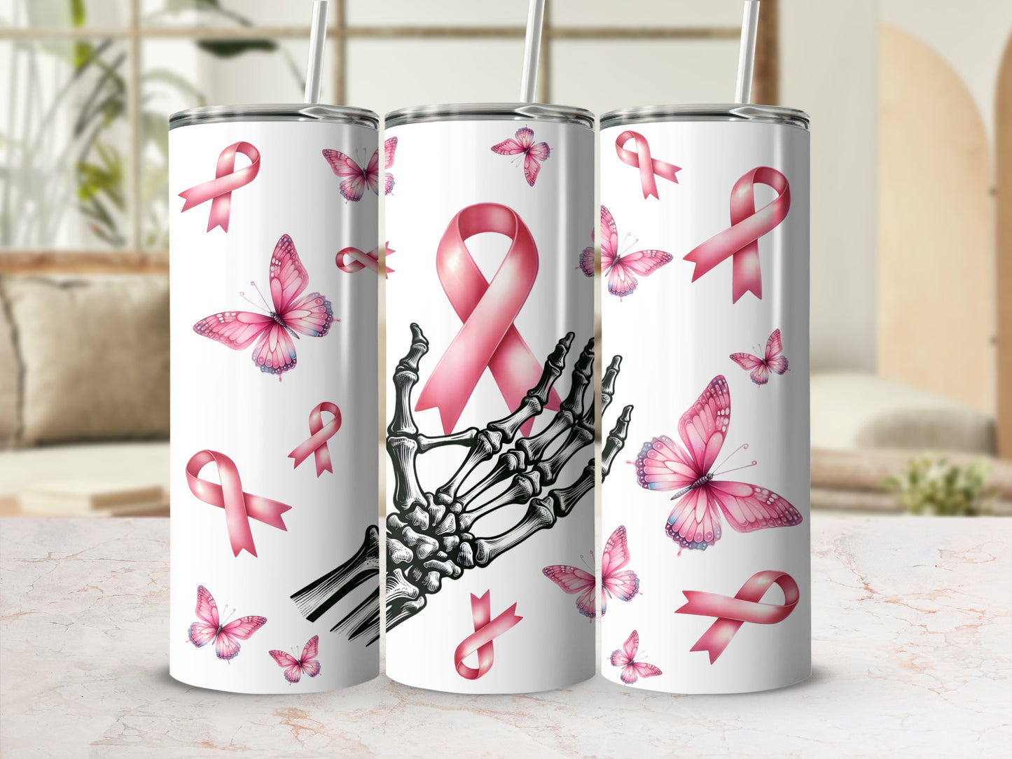 Skeleton hand with pink ribbon and butterflies on a tumbler.