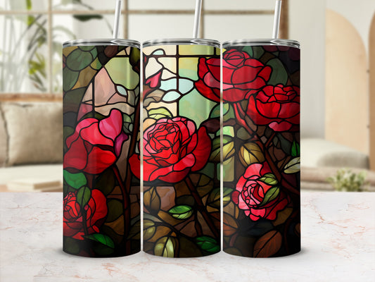Three tumblers with a stained glass rose design and white straws.