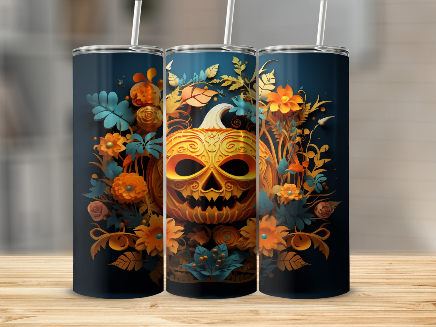 Three tumblers with a jack-o'-lantern and floral Halloween design.