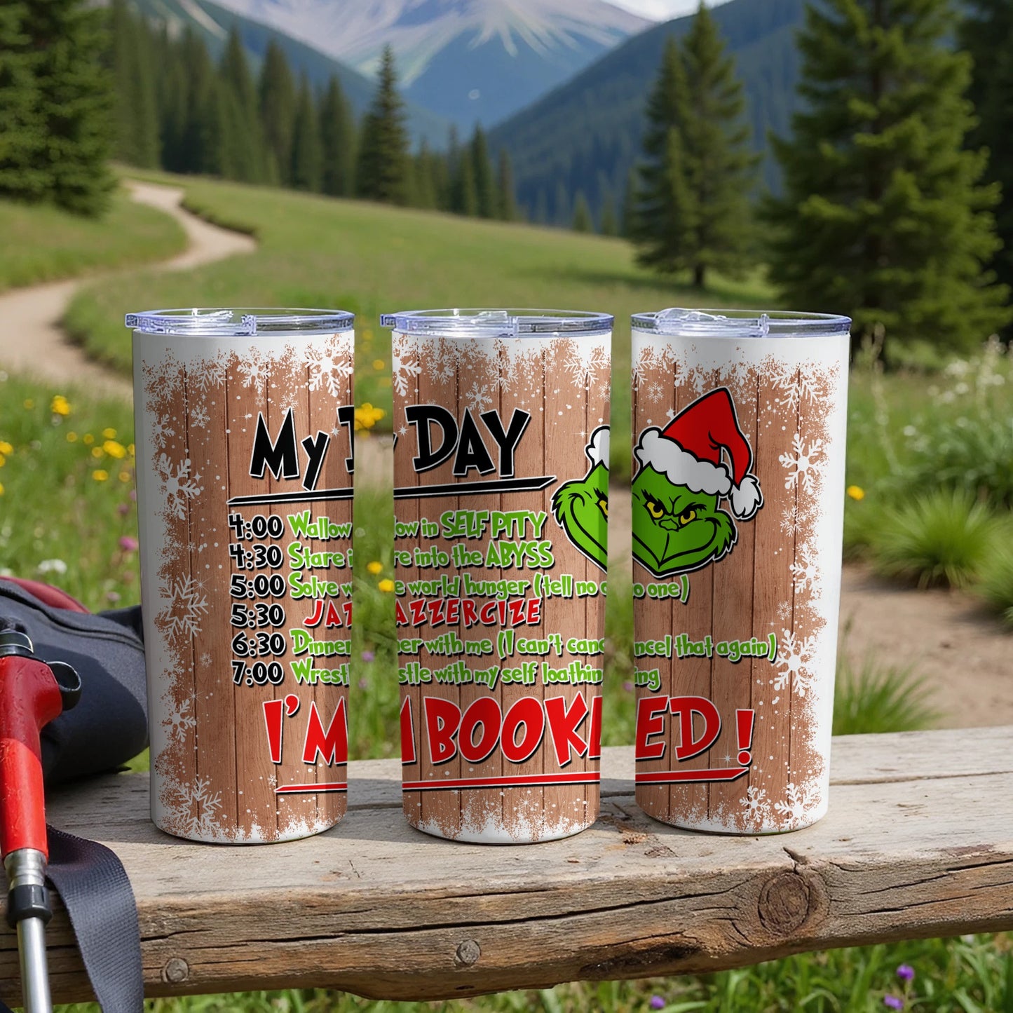 Three festive tumblers with Christmas-themed quotes about a bad day.