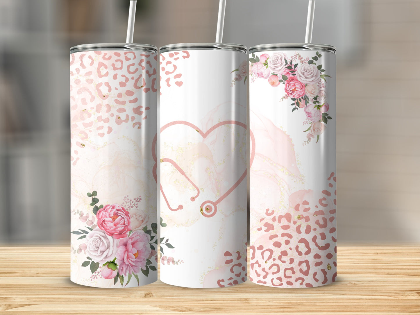 White tumblers with pink floral and leopard print designs, featuring a stethoscope.