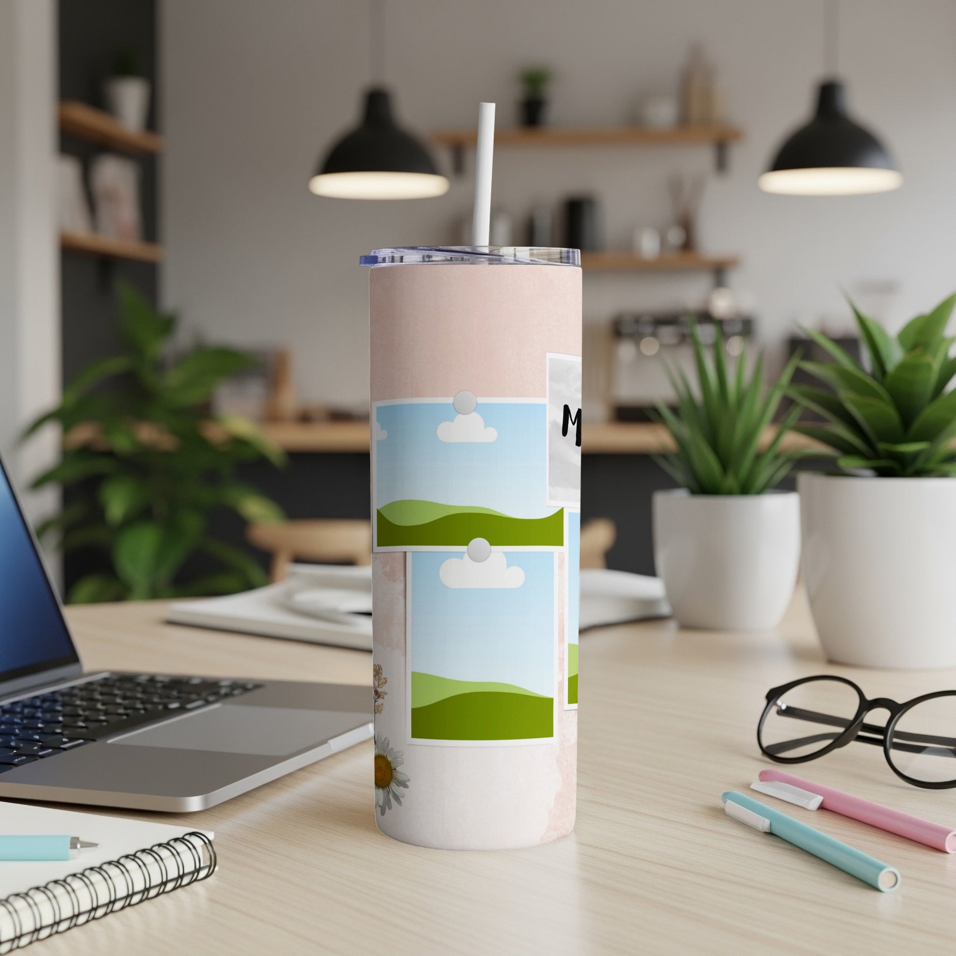Pink skinny tumbler with photo frames and daisy design, includes straw.