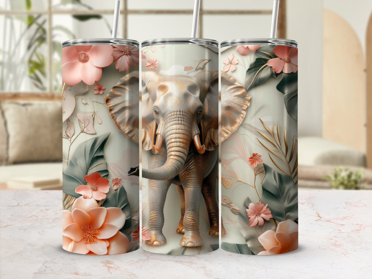 Three tumblers with a golden elephant and floral design.
