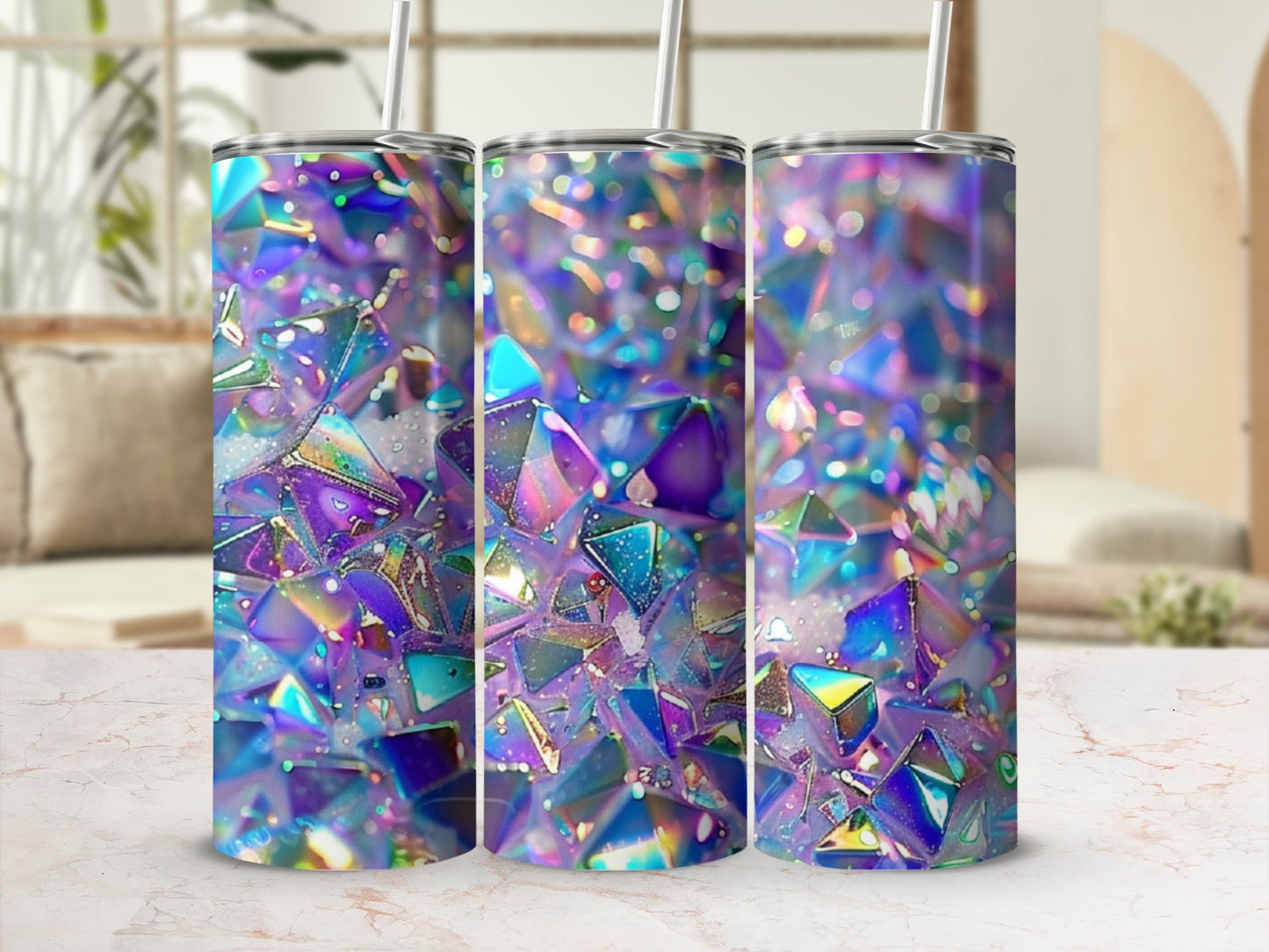 Three iridescent tumblers with geometric glitter pattern and straws.
