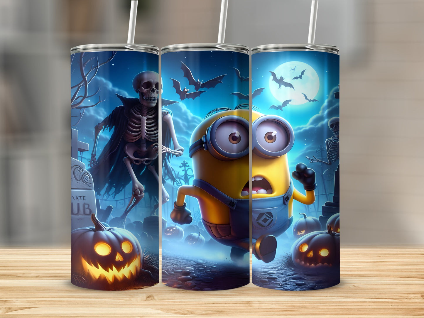 Minion and skeleton Halloween design with pumpkins and bats on three tumblers.