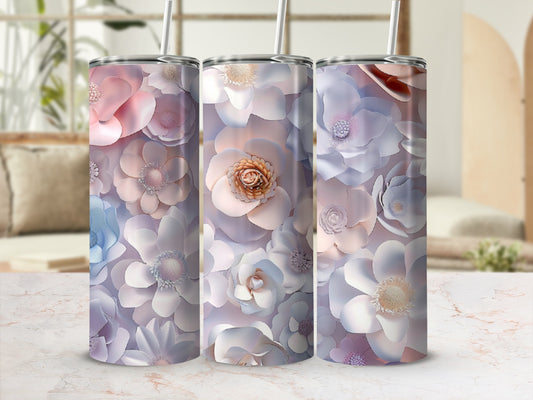 Three tumblers with pastel floral designs, featuring rose gold accents.