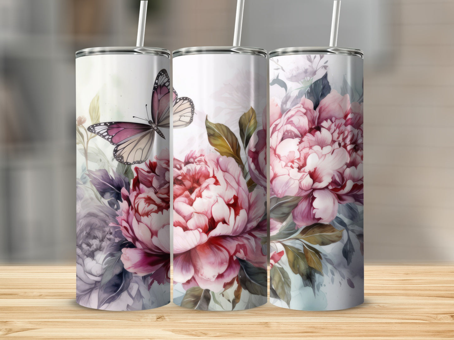 Three tall tumblers with pink peonies and a butterfly design.