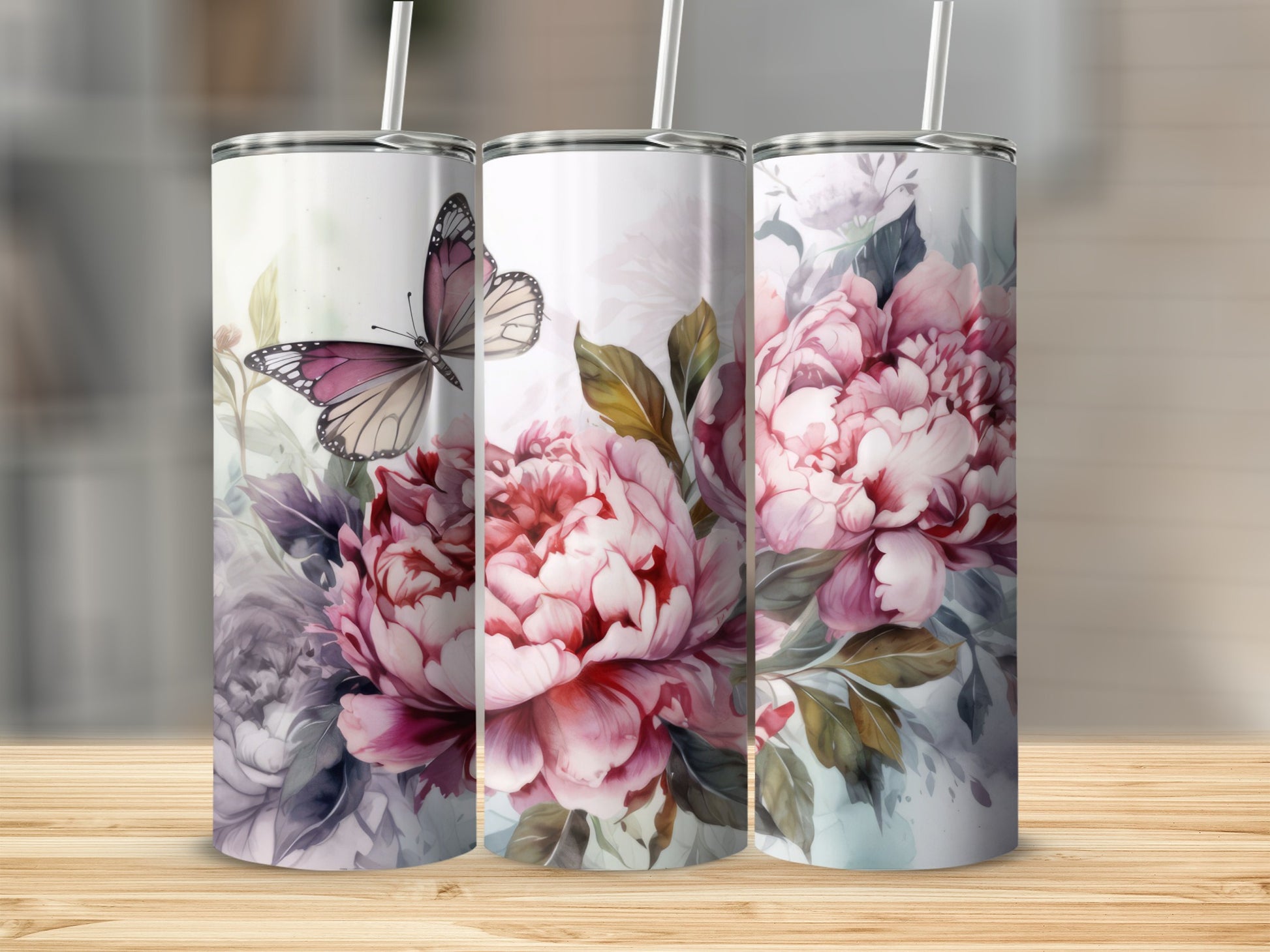 Three tall tumblers with pink peonies and a butterfly design.