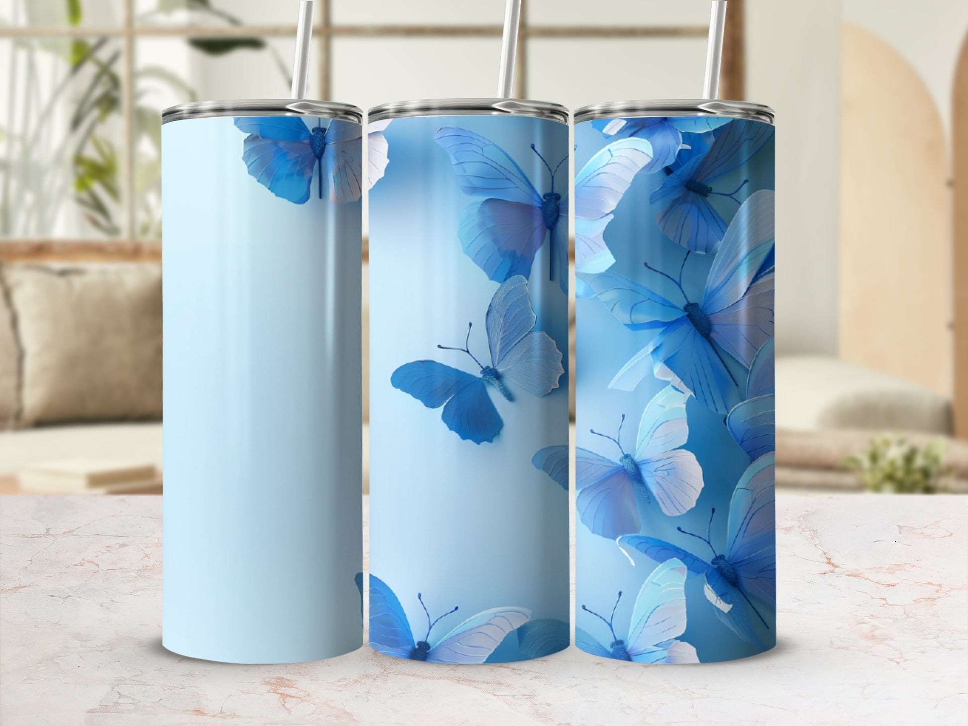 Light blue tumbler with blue butterflies, set against a blurred background.