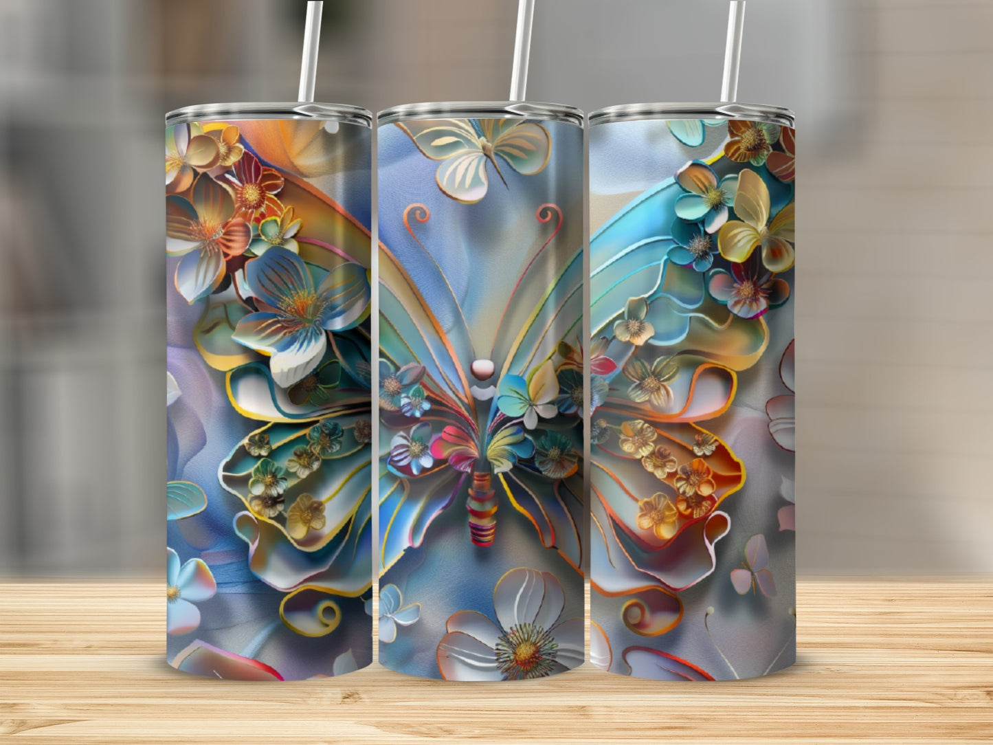 Three tumblers featuring a colorful butterfly and floral design.