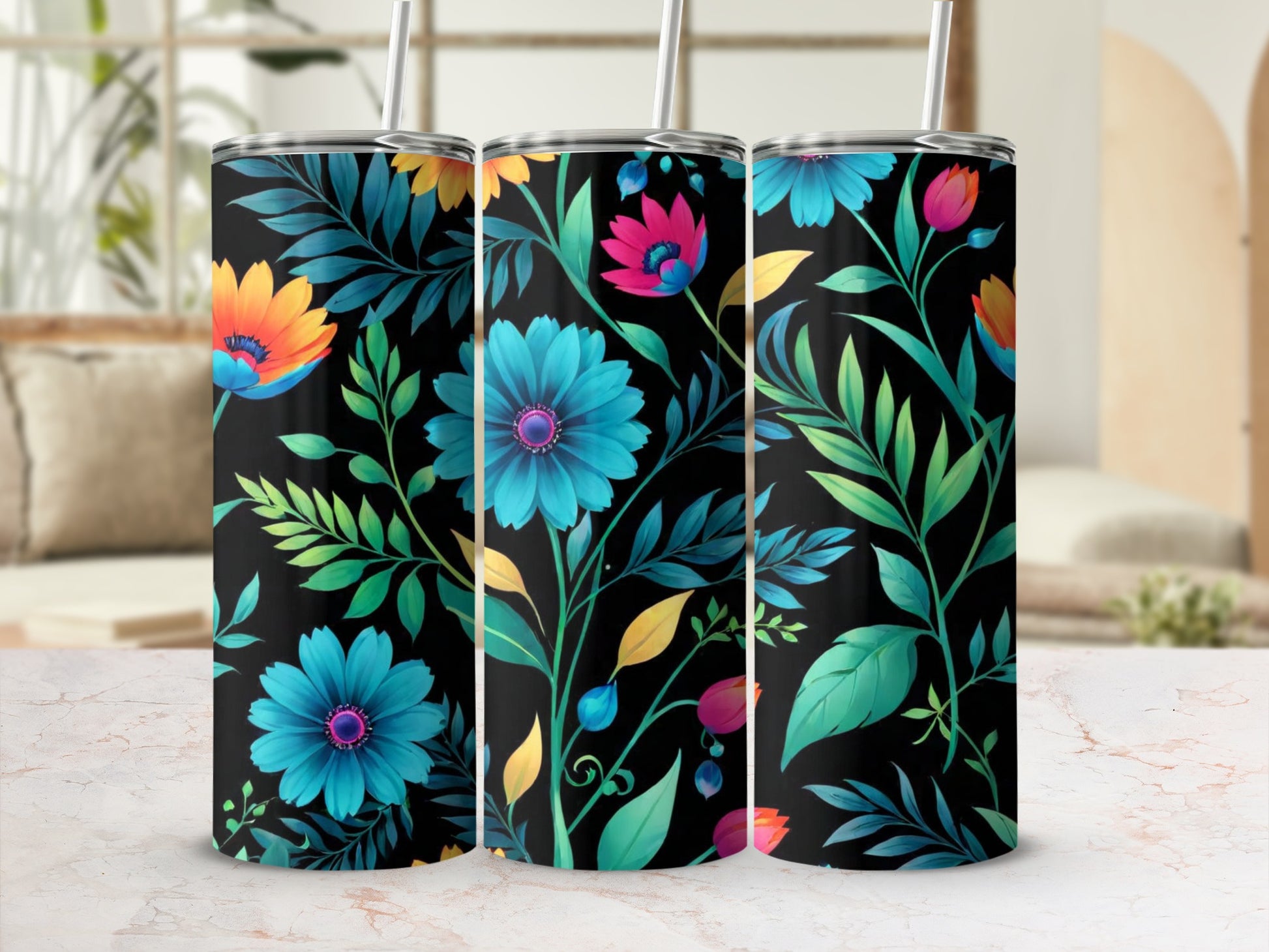 Three tumblers with a black background and colorful floral and leaf pattern.